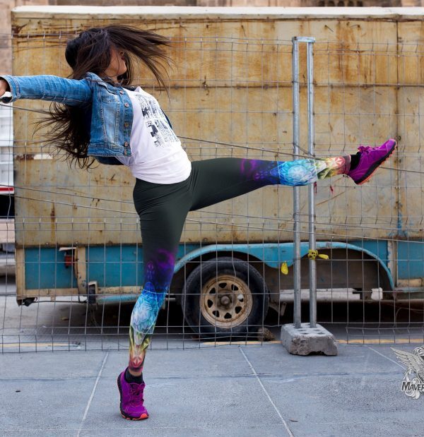 girl-dancing-on-the-street-while-wearing-leggings-rainbow flower of life